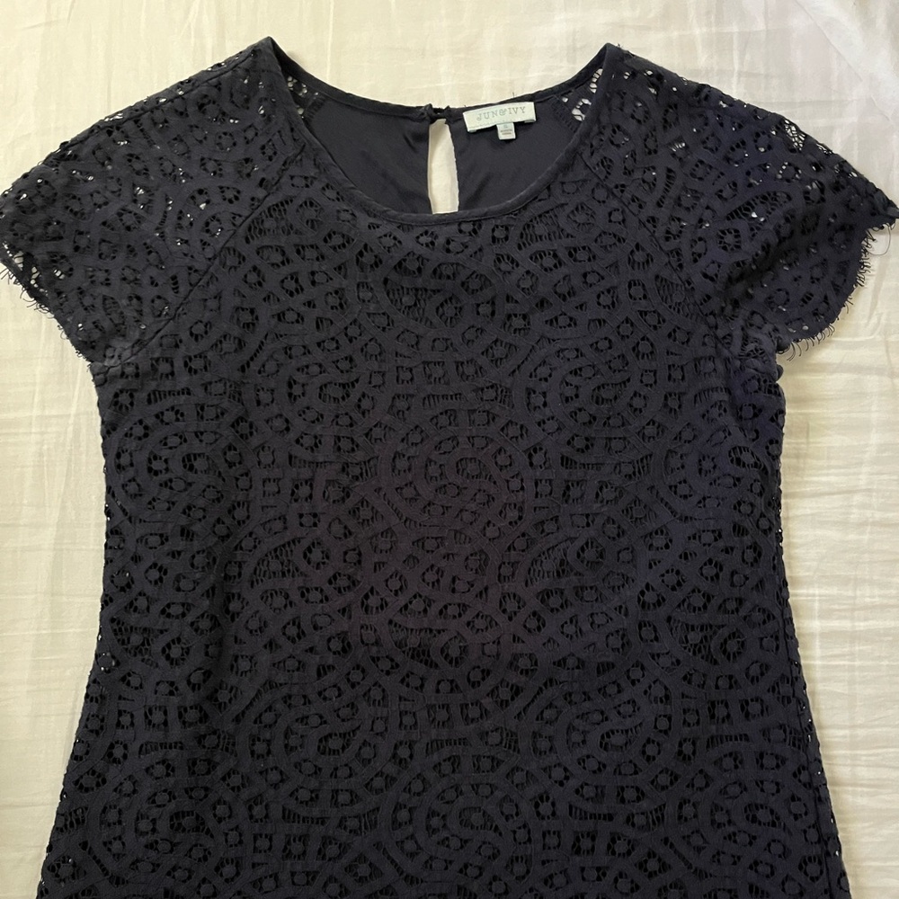 Navy blue lace shirt with scalloped bottom detail